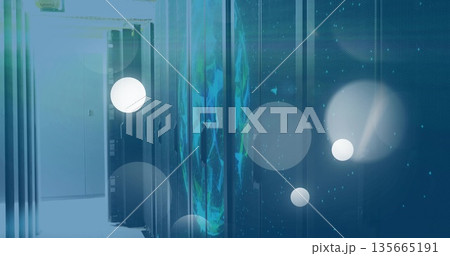Glowing server racks projecting digital globe in data center aisle, with LED lights, light flares 135665191