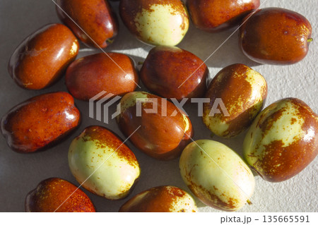 These are dates that are ripening red. These are dates that are ripening red. 135665591