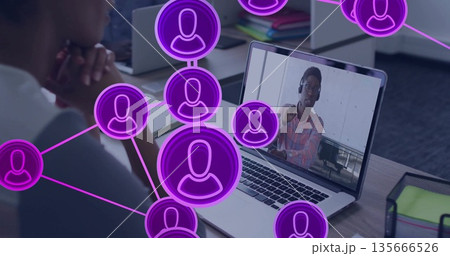 Worker watching laptop at desk with headset purple network overlay, leaning on hands, copy space Worker watching laptop at desk with headset purple network overlay, leaning on hands, copy space 135666526