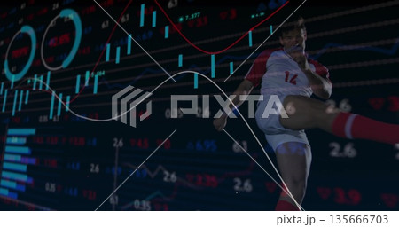 Kicking soccer player in white jersey striking finance screen, with candlestick charts, copy space 135666703