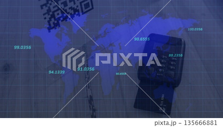 Displaying payment terminal keypad reading credit card on desk, with world map overlay and QR code Displaying payment terminal keypad reading credit card on desk, with world map overlay and QR code 135666881
