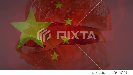 Showcasing hamburger featuring meat patty in poster with flames and Chinese flag overlay Showcasing hamburger featuring meat patty in poster with flames and Chinese flag overlay 135667792
