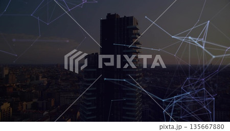 Highlighting modern high-rise stacking terraces at dusk over rooftops, with glowing network overlay Highlighting modern high-rise stacking terraces at dusk over rooftops, with glowing network overlay 135667880