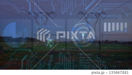 Dominating steel lattice towers carrying power lines across grassy field at dusk, with HUD overlays Dominating steel lattice towers carrying power lines across grassy field at dusk, with HUD overlays 135667881