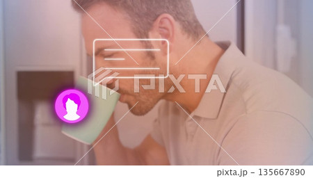 Man in polo sipping beverage in kitchen, with green mug, purple avatar, chat overlays, copy space 135667890