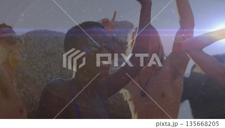 Smiling friends dancing on rooftop at sunset, with sunglasses pendant swim top sleeveless tops 135668205
