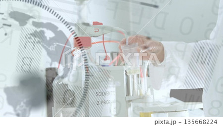 Gloved hand holding sample cup near labeled solvent bottle in lab, with pipette, data overlay Gloved hand holding sample cup near labeled solvent bottle in lab, with pipette, data overlay 135668224