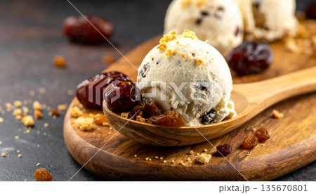 Gourmet cranberry sauce with spices served in a glass bowl on a white plate makes a delicious and fresh fruit dessert for a healthy meal 135670801
