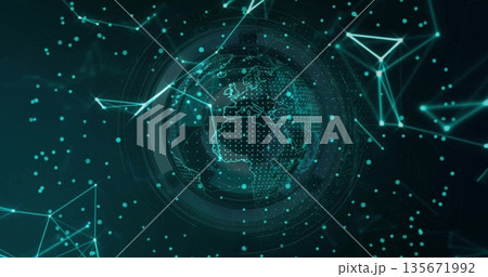 Rotating holographic globe displaying dotted continents in digital interface, with rings and mesh 135671992