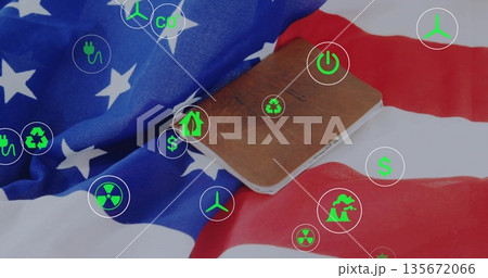 Displaying brown leather notepad on folded US flag desk featuring digital energy and finance icons Displaying brown leather notepad on folded US flag desk featuring digital energy and finance icons 135672066