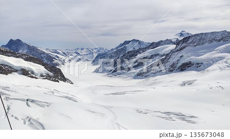 Interlaken,  Switzerland - March 18 2023: Surrounding View of Mountanious Interlaken 135673048