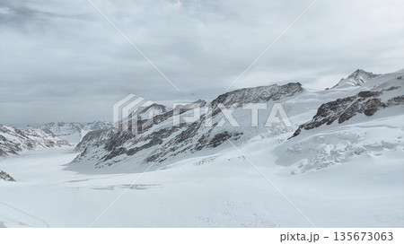 Interlaken,  Switzerland - March 18 2023: Surrounding View of Mountanious Interlaken 135673063