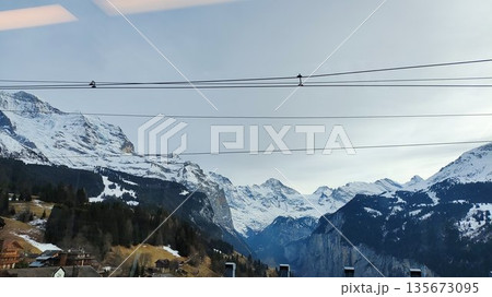 Interlaken,  Switzerland - March 18 2023: Surrounding View of Mountanious Interlaken 135673095