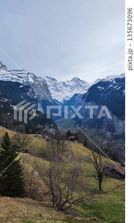 Interlaken,  Switzerland - March 18 2023: Surrounding View of Mountanious Interlaken 135673096