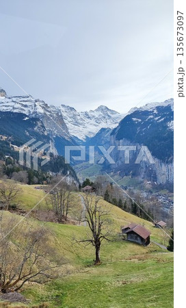 Interlaken,  Switzerland - March 18 2023: Surrounding View of Mountanious Interlaken 135673097