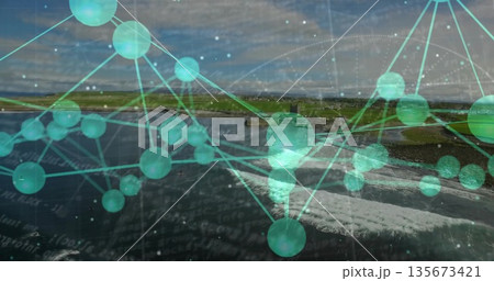 Overlaying turquoise network spanning rugged coast, with grassy cliffs and medieval tower ruin Overlaying turquoise network spanning rugged coast, with grassy cliffs and medieval tower ruin 135673421