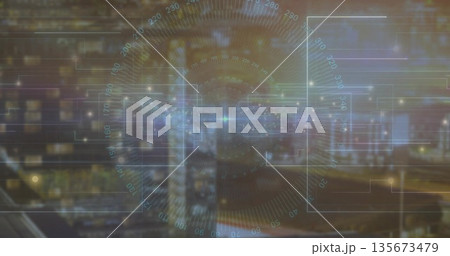 Displaying circular HUD projecting data panels over city at night, with numeric degree markings 135673479