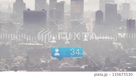 Floating blue bubble showing user icon number 34 over hazy skyline, with user silhouette icons Floating blue bubble showing user icon number 34 over hazy skyline, with user silhouette icons 135673530