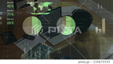 Data analyst in mustard sweater analyzing overlays on laptop, tablet, phone at desk, copy space 135673555