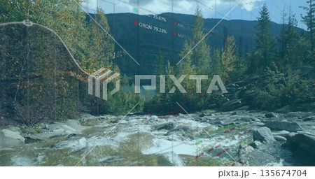 Flowing mountain stream cascading over rocky riverbed in forest, with data charts and gridlines 135674704