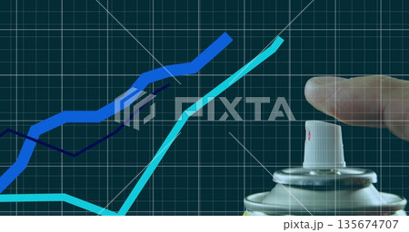 Pressing aerosol spray can nozzle with finger on green grid, colored line graphs, copy space 135674707