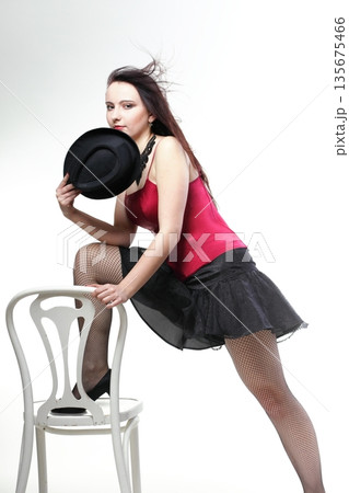 showgirl woman dance in red corset chair white isolated showgirl woman dance in red corset chair white isolated 135675466