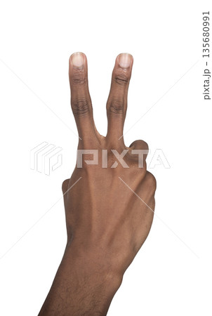 Finger gesture showing number two, African American man raising hand in a V sign. Symbol of peace, Finger gesture showing number two, African American man raising hand in a V sign. Symbol of peace, 135680991