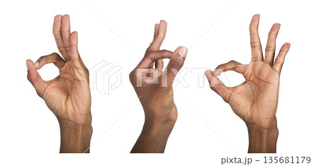 OK hand gesture, African American man forming a circle with fingers, symbol of approval and success. OK hand gesture, African American man forming a circle with fingers, symbol of approval and success. 135681179