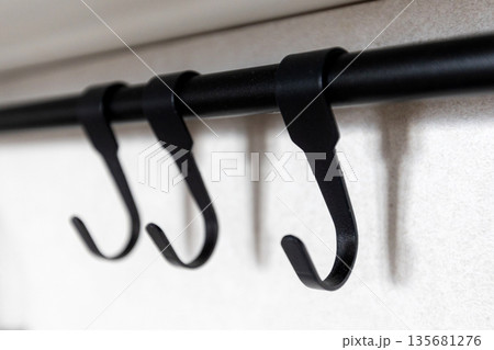 Black metal wall hanger rail and hooks 135681276