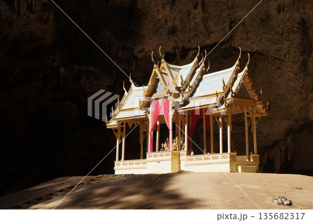 Phraya Nakhon Cave is located in Khao Sam Roi Yot National Park in Prachuap Khiri Khan Province in southern Thailand. Sunlight illuminates the cave.Phraya Nakhon Cave Temple. 135682317