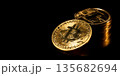 Bitcoin Cryptocurrency. Gold coins on black background. 135682694
