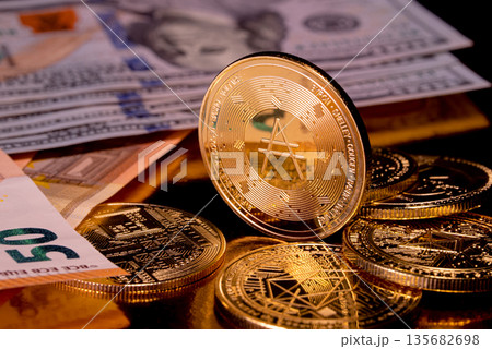 Gold Cardano ADA Coin with Bitcoin, EOS, Euro and Dollar Banknotes. Gold Cardano ADA Coin with Bitcoin, EOS, Euro and Dollar Banknotes. 135682698