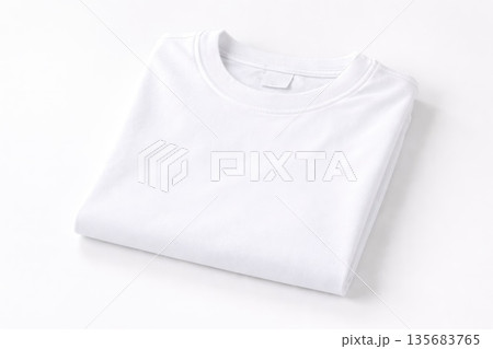 Minimalist Folded White T Shirt Isolated on Clean Background Minimalist Folded White T Shirt Isolated on Clean Background 135683765