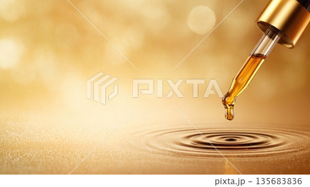 Golden Oil Drop Falling from Glass Dropper, Luxury Skincare and Wellness Concept 135683836