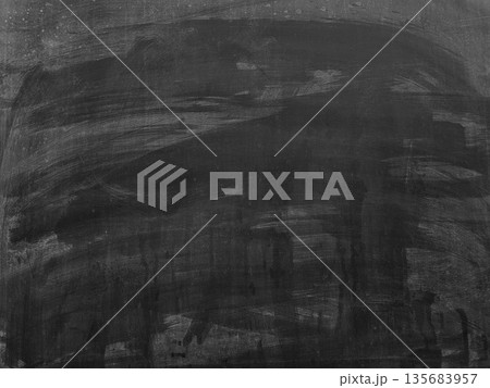 Abstract traces of rubbed out chalk on blackboard. 135683957