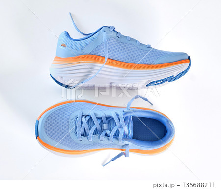Blue running shoes for fitness training and healthy lifestyle Blue running shoes for fitness training and healthy lifestyle 135688211