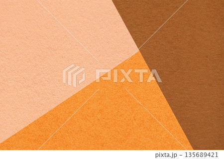 Geometric brown orange peach texture paper background with copy space for presentation, banner template 135689421
