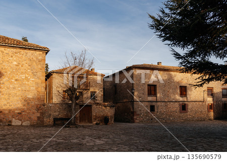 Medinaceli medieval village street with traditional stone house 135690579