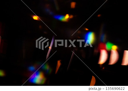 Colored light effects on dark background with grain and magic lights. Neon Glow Modern 90s, lo-fi Aesthetics. Design effect. 135690622