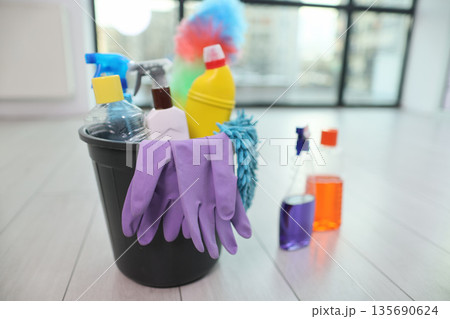 Bright and clean tools ready for a thorough spring cleaning session in a sunny room Bright and clean tools ready for a thorough spring cleaning session in a sunny room 135690624