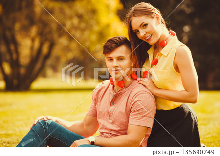 Affectionate couple cheering together. 135690749