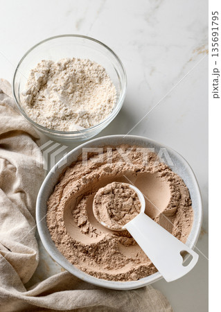 various plant based protein powders various plant based protein powders 135691795