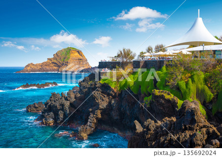 View of the small resort village of Porto Moniz on the Atlantic coast of Madeira Island, Portugal 135692024
