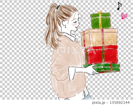 クリスマスプレゼントをもらって喜んでいる女性 135692144