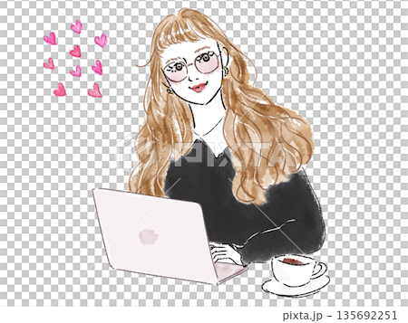 A woman using a computer 135692251