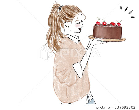 バレンタインチョコを渡す女性 135692302