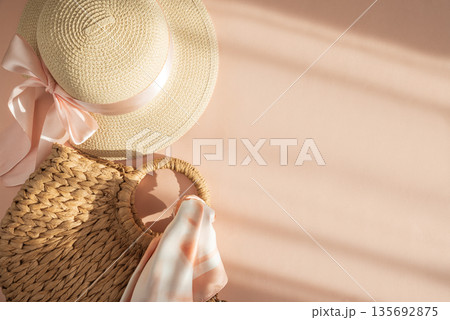 Straw Hats and Handbag. Elegant Spring Summer Fashion Flatlay on Pink Background Straw Hats and Handbag. Elegant Spring Summer Fashion Flatlay on Pink Background 135692875