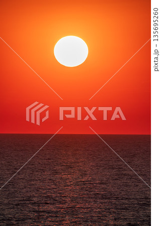 Beautiful red and orange sunrise over the sea. 135695260