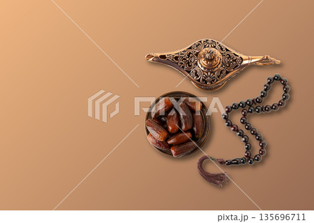 Traditional dates and prayer beads displayed for Ramadan Traditional dates and prayer beads displayed for Ramadan 135696711
