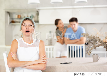Furious guy and girl screaming to mother Furious guy and girl screaming to mother 135697058